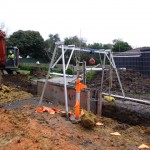 Access gantry in use over trench.
