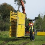 LITE guard stand shields (single skinned) being moved via excavator